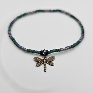Glass seed bead bracelet with dragonfly charm